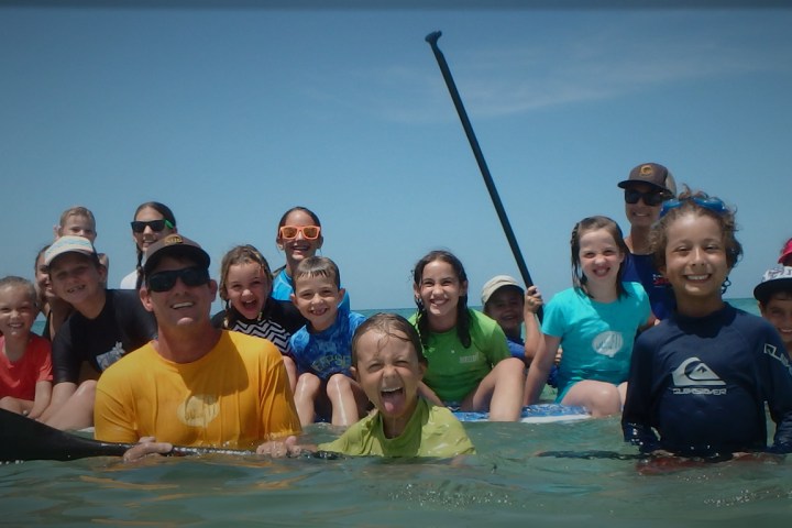 a group of people in the water