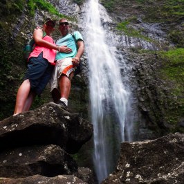 a man riding on the back of a waterfall