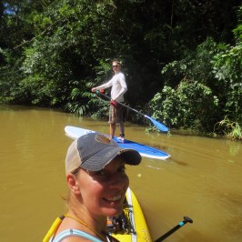 a man in a boat on a body of water