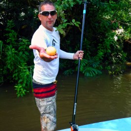 a man that is standing in the water