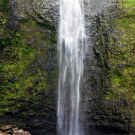 a man riding on the back of a waterfall