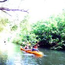 a small boat in a body of water