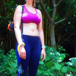 a woman wearing a costume posing for the camera