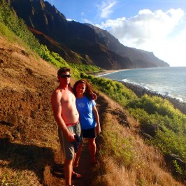 a person standing in front of a mountain