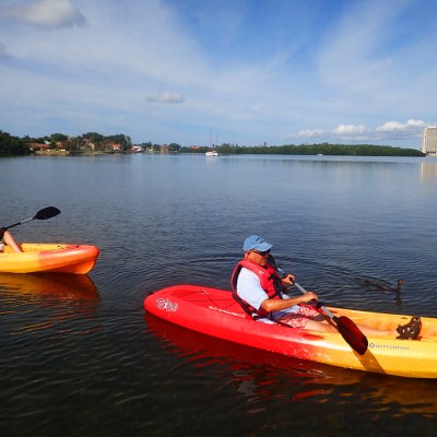 a small boat in a body of water