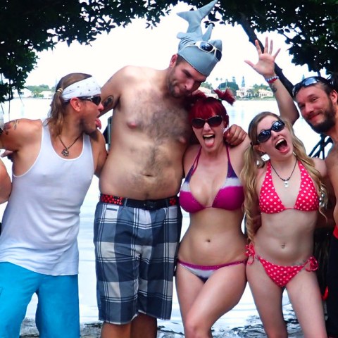 a group of people posing for the camera