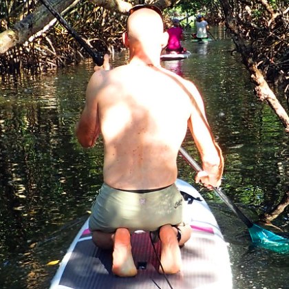 a person standing in front of a lake