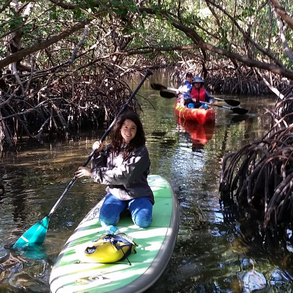 a person standing in front of a lake