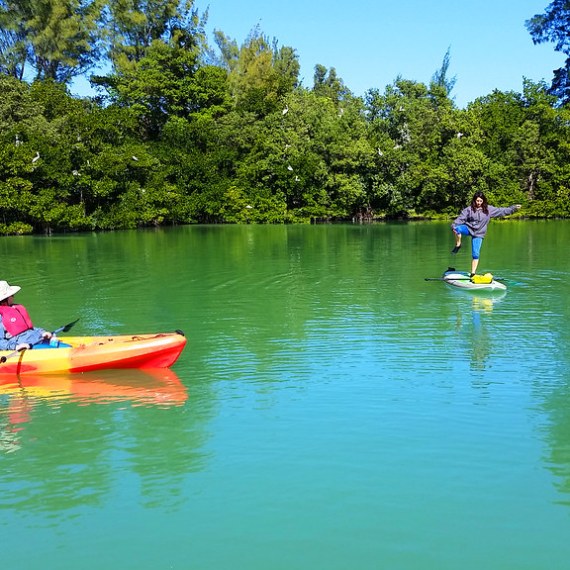 a small yellow boat on a lake