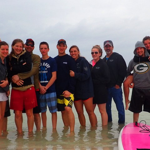 a group of people posing for the camera