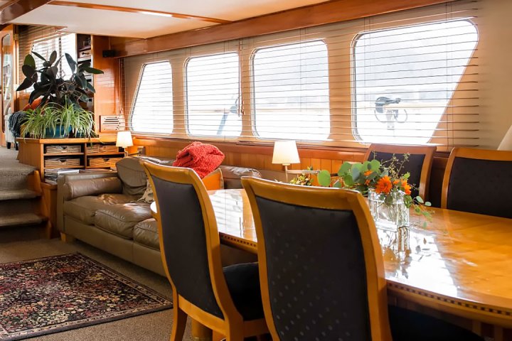 a dining room table in front of a window